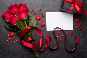 Valentines day greeting card with red rose flowers and sweets