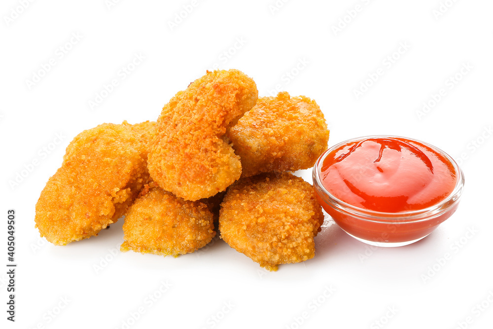 Tasty nuggets with ketchup on white background