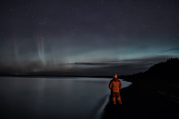 northern lights lonely man lakeside beautiful nature night sky landscape