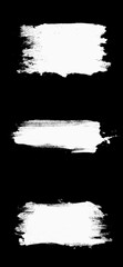 Poster - set three white strokes of paint isolated on a black background.