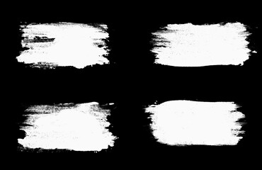 Poster - set white strokes of paint isolated on a black background. design brush