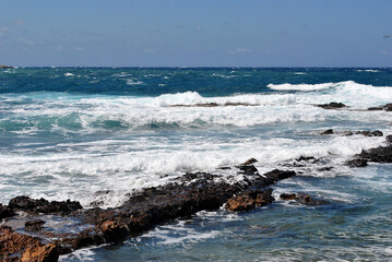 waves crashing on rocks