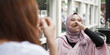 © HumbaFrame - Asian hijab woman smilling in cafe with friend