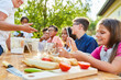 © Robert Kneschke - Group of kids has fun learning to cook