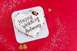 Fototapeta Na sufit - Heart shaped cake for wedding anniversary, top view.