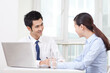 © eastfenceimage - Group of business people discussing in office