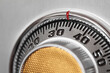 © Bryan Mullennix/Tetra Images - Close-up of safe combination dial