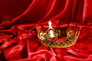 Sticker - Beautiful golden crown on red fabric. Fantasy item