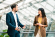 © Joseffson/Westend61 - Businessman with female colleague discussing in office