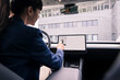 © Joseffson/Westend61 - Female professional navigating through device while sitting in car
