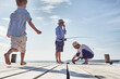 © Connect Images - Boy with father and grandfather fishing, Utvalnas, Sweden