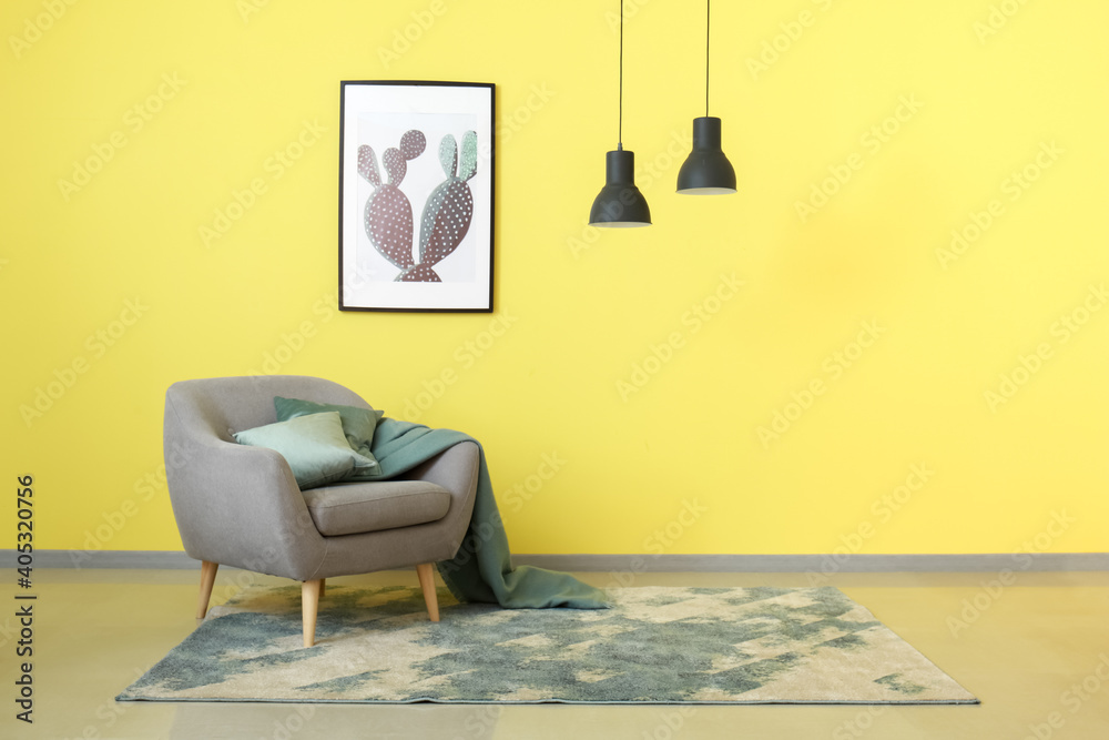 Cozy armchair in interior of living room - obrazy, fototapety, plakaty 
