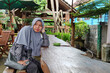 © onyengradar - selective focus Beautiful women wearing hijab while relaxing in a cool cafe,  and noise image