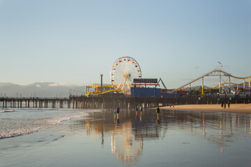 Attraction park on the beach, the blue sea, and tourists