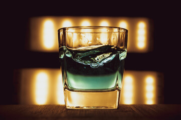 Wall Mural - Selective focus shot of vodka shot - minimalistic still life