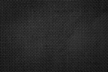 Poster - Jute hessian sackcloth canvas woven texture pattern background in light black color blank empty.