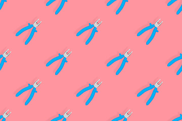 Pliers seamless pattern. Metal pliers with rubber grips.