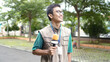 © HumbaFrame - asian male journalist wear vest and ready for news