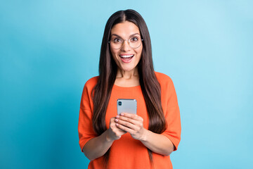 Sticker - Photo of positive pretty lady eyewear open mouth unexpected user follow isolated on blue color background