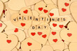 © Carles - Valentine's Day background. A stack of hearts with the phrase valentines day. Valentine's Day concept. Flat view, top view, copy space