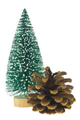 Wall Mural - Green artificial tree in the snow and pine cone isolated on a white background close-up.