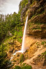 Wall Mural - Long exposure of the Pericnik slap or Pericnik Fall, Triglav National Park, Slovenia. It is a big waterfall that falls from the cascade.