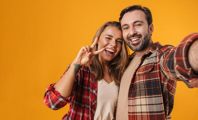 Canvas Print - Portrait of a cheerful young couple embracing