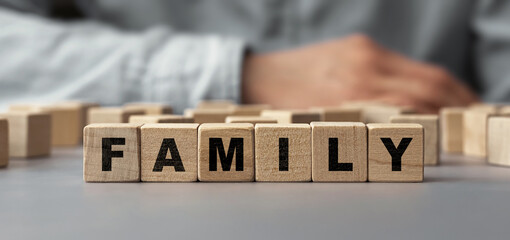 the word family made from wooden cubes. selective focus