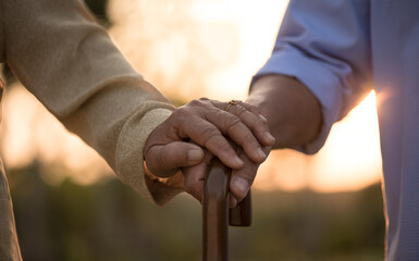 Love and Valentine day concept. A happy senior couple holding hand ,love symbol, happy marriage, Senior healthcare and relationship.