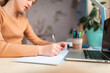 © len44ik - Beautiful schoolgirl studying at home doing school homework. Distance learning online education