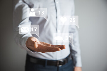 View of a Business man holding Social network