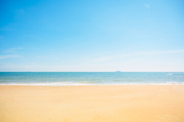 Landscape with white beach, the sea and the beautiful clouds in the blue sky