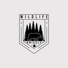 Wall Mural - wildlife logo vector illustration design. silhouette grizzly bear badge symbol