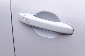 Wall Mural - Door handle of new white car