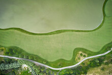 Green Field And Pond On A Golf Course From Above Aerial