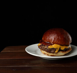 Delicious homemade hamburger on wood