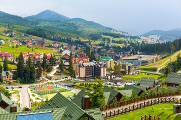 Wall Mural - Ski resort base Bukovel in Karpaty mountains in summer day