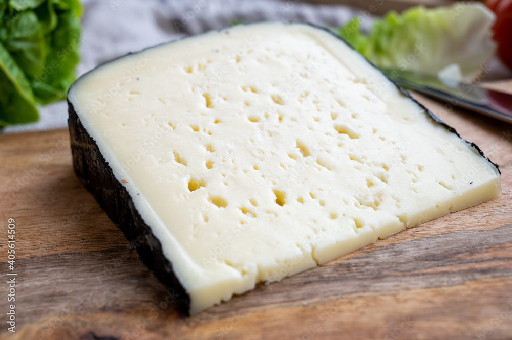 Cheese collection, French fol epi cheese with many little holes, etorki ...