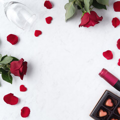 Top view of Valentine day chocolate with rose and wine, festive gift design concept