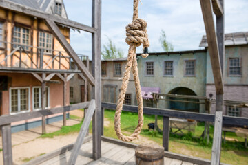 Empty scaffold with a place for execution and wooden gallows. Architecture houses of the European middle ages, Wooden scenery of the old city for filming feature films