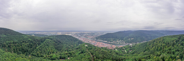 Wall Mural - Aerial drone shot of Heidelberg from Konigstuhl hill in overcast summer morning