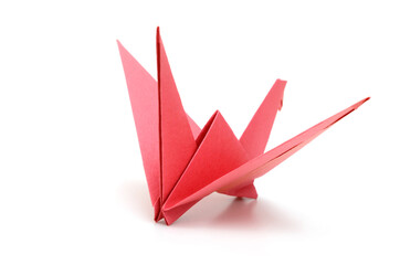 Wall Mural - origami red bird paper on white background