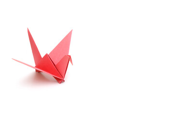 Wall Mural - A red origami bird on white