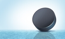 Hockey Puck Background On An Ice Rink With Blank Copy Space As A Winter Team Sport 