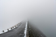Breathtaking View Of A Pier Completely Hidden In The Fog