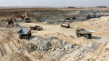 Coal Mining Open Pit With Many Large Trucks For Coal Transporting In South Africa