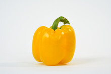 Yellow Bell Pepper. Fresh Yellow Sweet Pepper On White.  Food Concept. Product For Sale. Studio Photo.  Copy Space. 
