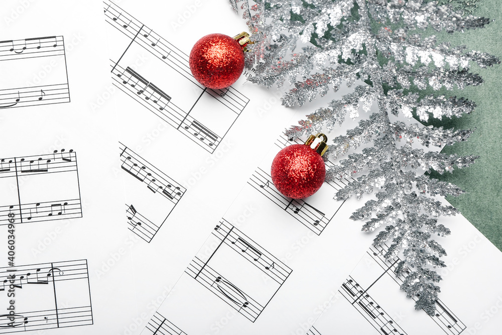 Music sheets with notes and Christmas decor