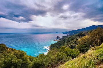 high angle shot of the wild north side of skopelos island on a cloudy day