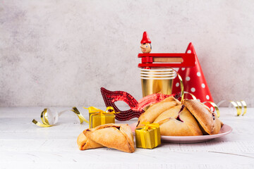 purim celebration background. jewish carnival. mask, traditional jewish hamantaschen cookies cakes, 